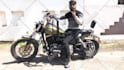 be your spokesperson sitting on harley davidson motorcycle