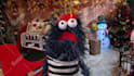create a fun video with a blue hairy monster puppet