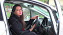 create female spokesperson video with real car background