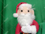 create a personalized video message with the santa claus puppet