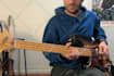 be your bass teacher and give you bass guitar lessons