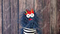 create a fun video with a blue hairy monster puppet
