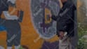 paint real graffiti art on the street wall