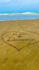 write any message or name on a tropical beach sand