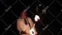 with fireworks on my head, juggle 3 fire clubs