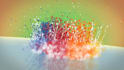 make colorful liquid particles splash animation for the logo