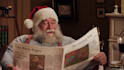 make santa claus reading newspaper christmas greeting video