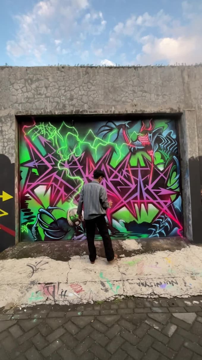 paint graffiti based on your request on wall