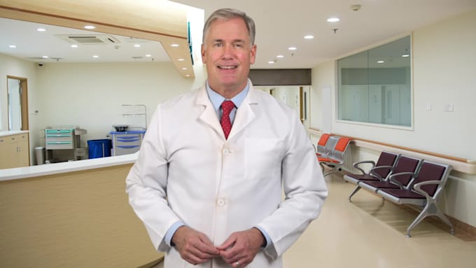 create medical spokesperson video in lab coat or scrubs
