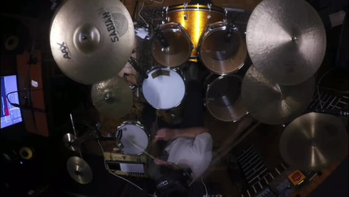 Hire a freelancer to play and record professional drums track for your song