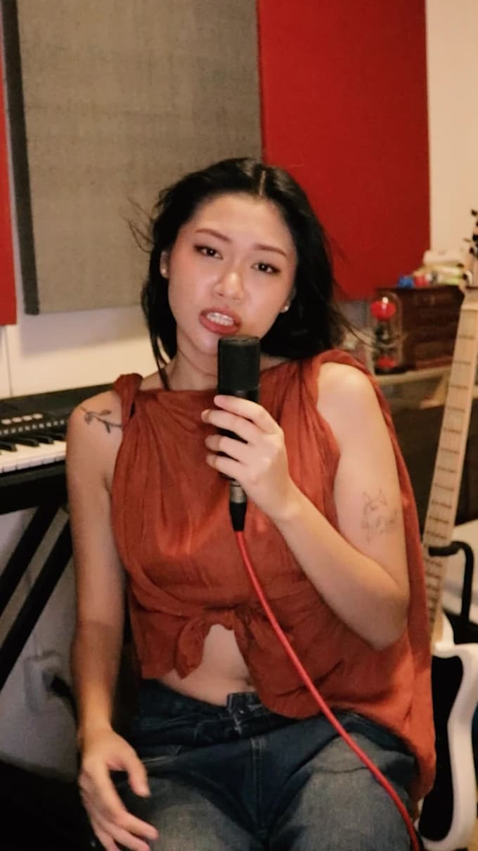 be your versatile female vocalist, sing in any genre you prefer