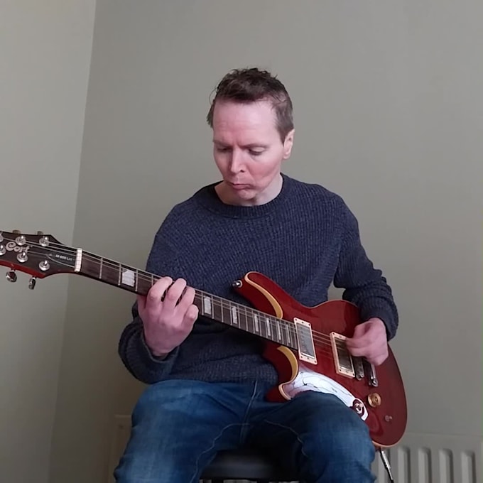 teach beginner guitar lessons
