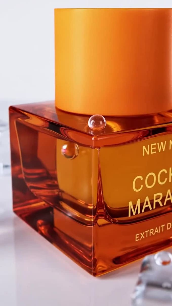 create a cinematic 3d perfume animation with realistic liquid simulation