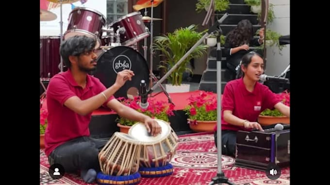 play indian classical instrument called tabla