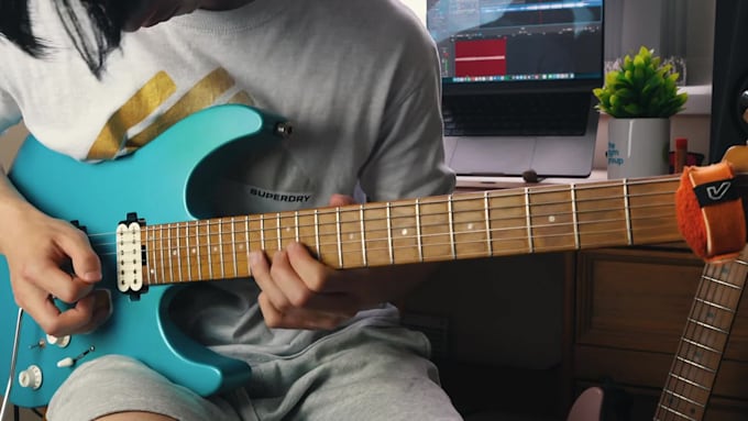 teach you electric guitar on zoom