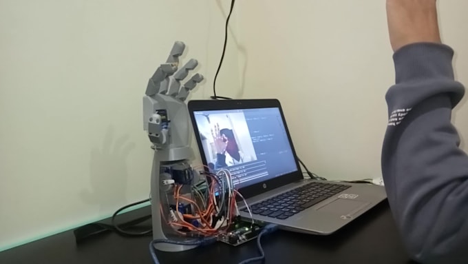 do a prosthetic hand that works using a camera with ai