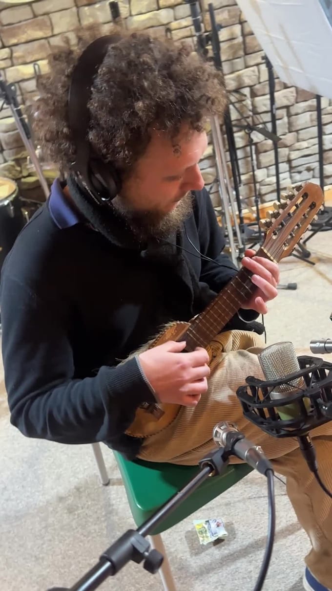 compose and record authentic argentine folk music with real instruments