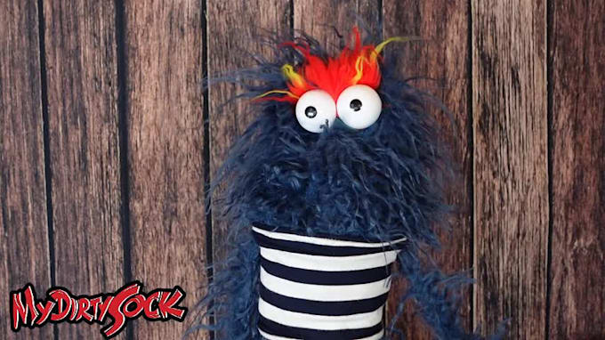 create a fun video with a blue hairy monster puppet