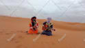 wish you a happy birthday in the sahara desert with a guitar