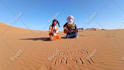 wish you a happy birthday in the sahara desert with a guitar