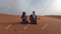 wish you a happy birthday in the sahara desert with a guitar