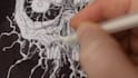 draw a horror skull with black ink pen