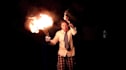 with fireworks on my head, juggle 3 fire clubs