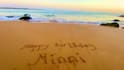write any message or name on a tropical beach sand