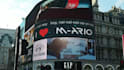digitally add your content to the billboard of piccadilly, london, in this video