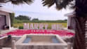 create valentine wish in swimming pool with flowers