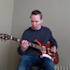 teach beginner guitar lessons