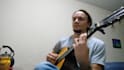enseñar cómo tocar cualquier canción en guitarra