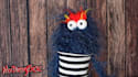 create a fun video with a blue hairy monster puppet